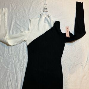 Fame Two-Tone Black and White sweater of the shoulder new with tags size small